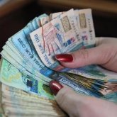 Қаржы министрлігі 21 мың теңгені кімдер алатынын түсіндірді