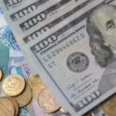 Тенге укрепился до 374 за доллар на бирже