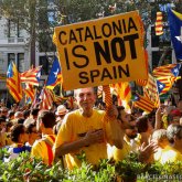 Каталонияда халық шеруге шығып, полициямен қақтығысты