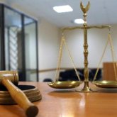 «Өкілеттігін асыра пайдаланды»: Экс-президент сотқа жедел жәрдеммен жеткізілді