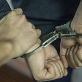 Шымкентте жалған доллар жасап, есірткі сатқандар қамауға алынды