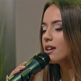 «Таптым-ау сені»: Португалиялық қыз қазақ әндерін орындап, көпшілікті тәнті етті (ВИДЕО)