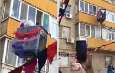 Жаңа түскен келінді қайын жұрты үшінші қабатқа кранмен көтерді (ВИДЕО)