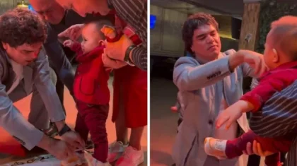 Әнші Кенжебек баланың тұсауын кесіп, оған қомақты ақша сыйлады (ВИДЕО)